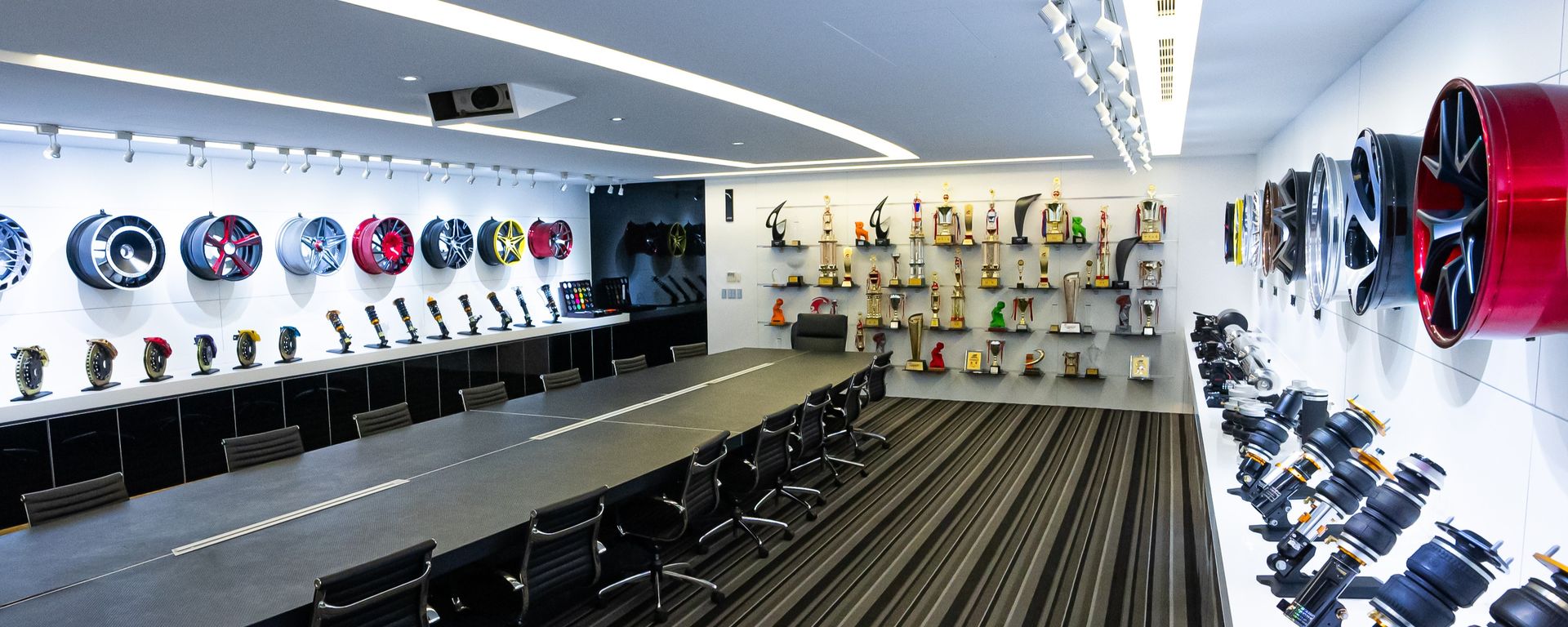 Wheel, suspension and trophy display in the meeting room
